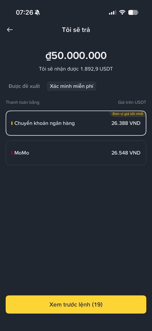 A mobile app screenshot in Vietnamese showing a sell order for 50,000,000 đ (đ50.000.000), equivalent to 1,892.9 USDT, with payment options including bank transfer and MoMo.