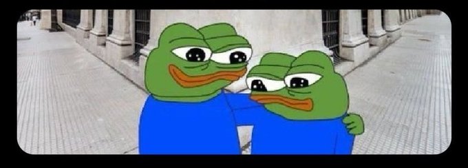 Two crying Pepe the Frog characters embracing in front of a stone building with columns.