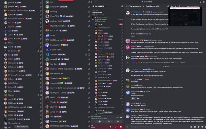 A Discord server interface displays an "AMA | ALPHA x GEMS · TwincieDoll Coin- AMA" channel with users discussing cryptocurrency details, including "0% transaction fees will eventually they are not even talked about now." The screenshot illustrates the AMA event mentioned in the post, where a user (PacmanBlur) engaged with the TwincieDoll Coin team about fee structures and potential airdrops for community members.