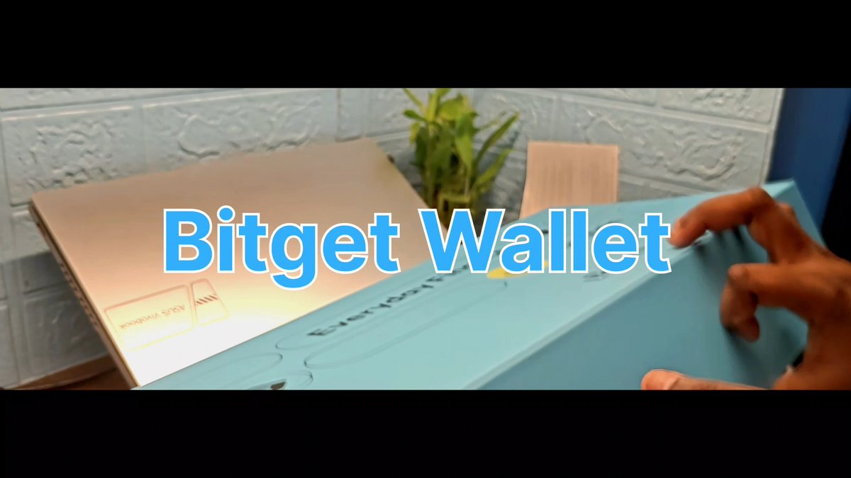 A video frame showing hands opening a blue box with the text 'Bitget Wallet' superimposed in large blue letters across the center.