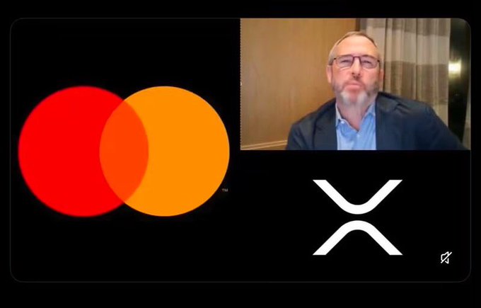 A video conference screen shows the Mastercard logo alongside the XRP cryptocurrency logo, with a bearded man wearing glasses visible in a video call window.