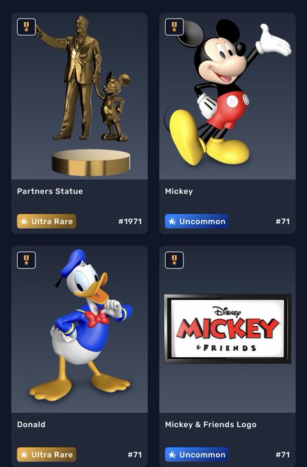 A collection of Disney-themed digital collectibles including a 'Partners Statue' (Ultra Rare, #1971), 'Mickey' (Uncommon, #71), 'Donald' (Ultra Rare, #71), and a 'Mickey & Friends Logo' (Uncommon, #71).