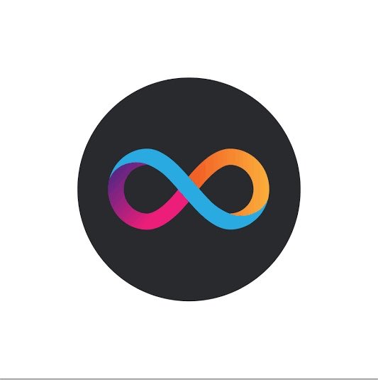 A dark circular icon featuring an infinity symbol rendered in gradient rainbow colors (purple, blue, pink, and orange) against a black background, representing the decentralized and continuous nature of blockchain technology discussed in the post about the UNDP Blockchain Accelerator program gaining new sponsors.