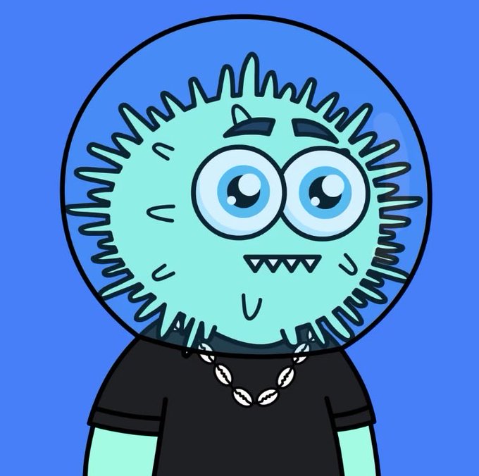 A cartoon character with a fuzzy cyan face, big blue eyes, sharp teeth, and a seashell necklace wearing a black shirt on a blue background.