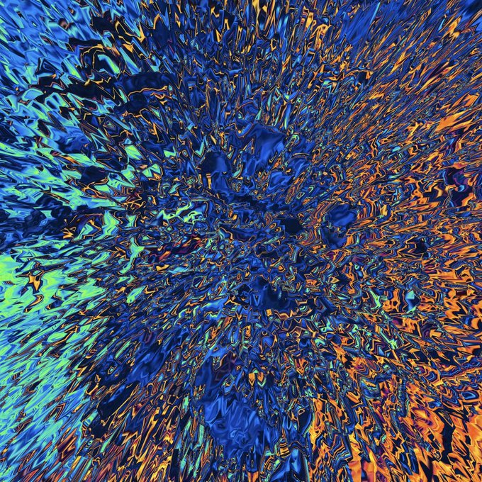 "Shard" is an abstract explosion of textured blue, green, and orange hues bursting outward in a shattered, crystalline pattern—evoking the breaking or fragmenting of glass-like shards—reflecting the series' title and the artist's 38th piece in a 39-piece collection.
