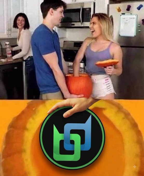 A meme image showing a couple holding a carved pumpkin and pie in a kitchen, with a hand reaching down toward a green and black 'G' logo against a pumpkin background.