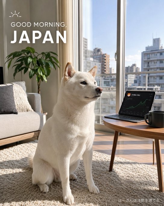 A white Shiba Inu named Yuki sits attentively on a rug in a sunlit Japanese apartment, gazing out the window at the city skyline while a laptop beside him displays a $SHIB price chart. The text "GOOD MORNING, JAPAN" with a sun icon appears in the upper left, perfectly matching the post's morning market check-in from Japan.