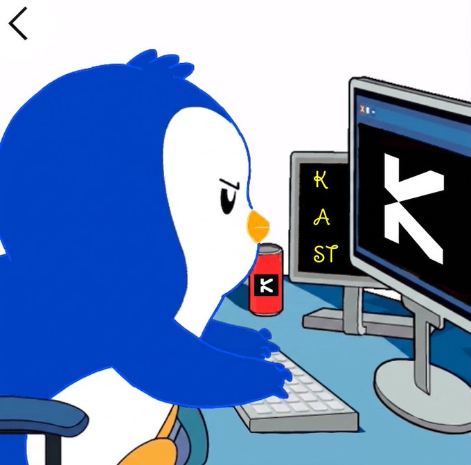 A cartoon penguin sits at a computer desk with monitors displaying the "K" logo, with a can on the desk and "KAST" written on the side screen.
