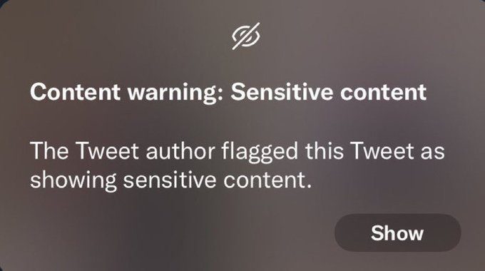 A content warning overlay displays "Content warning: Sensitive content" with a "Show" button, indicating the post about nipple sensitivity has been flagged by the tweet author.