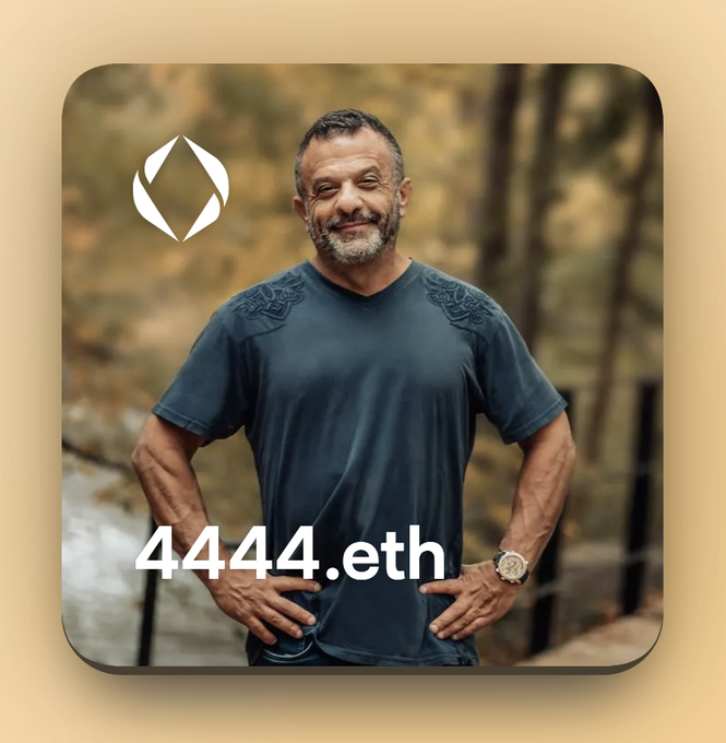 The image features a man wearing a blue shirt, standing next to a fence or bridge. The background of the image has trees visible behind him. There are two texts present in the image - one reading "Happy Birthday Adam!" and another text that says "4444.eth x Adam Weitsman". These texts seem to be related to an event or celebration involving the man, possibly his birthday.