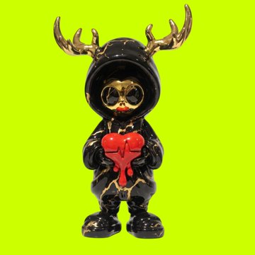 A black designer art toy figure with gold antlers, gold facial features, and a melting red heart held against its chest, set against a bright green background.