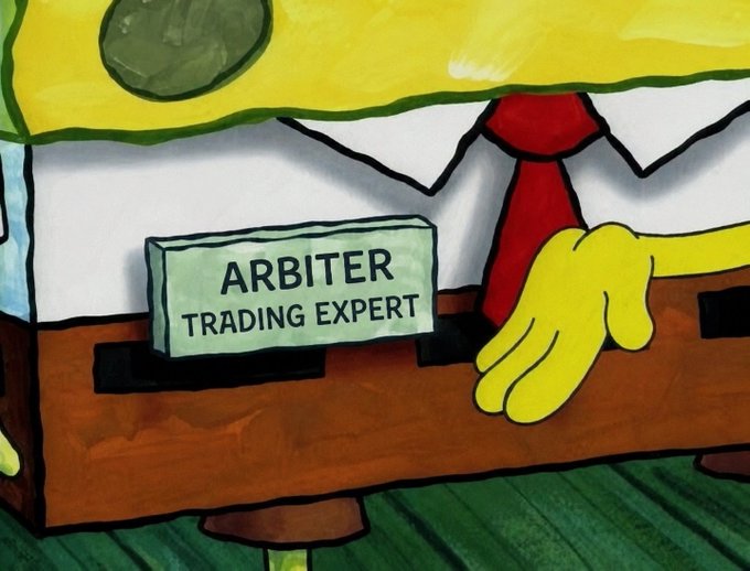 An animated scene showing a SpongeBob SquarePants-style character behind a desk with a nameplate reading 'ARBITER TRADING EXPERT', featuring yellow hands and a red tie.