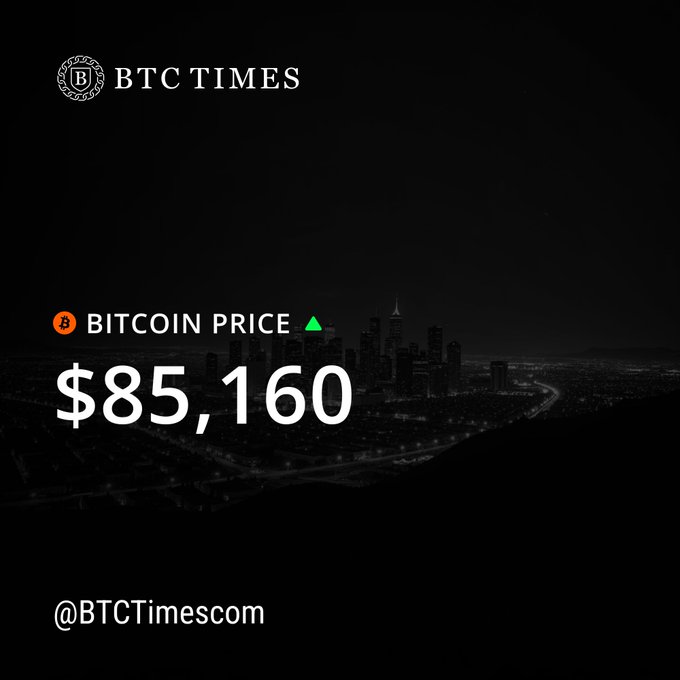 A dark-themed graphic from BTC TIMES displaying the BITCOIN PRICE at $85,160 with a green upward triangle, showing a city skyline at night as the background.