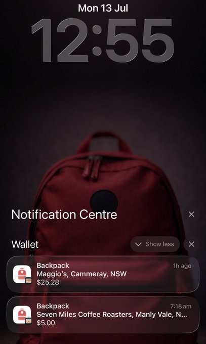 A smartphone lock screen showing the time 12:55 on Mon 13 Jul, displaying Wallet notifications for recent Backpack transactions at Maggio's and Seven Miles Coffee Roasters.