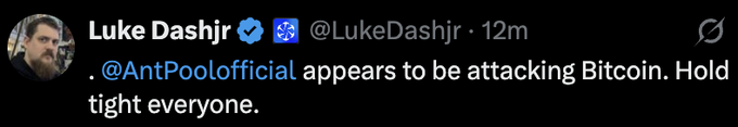 A screenshot of a tweet from Luke Dashjr (@LukeDashjr) stating: '.@AntPoolofficial appears to be attacking Bitcoin. Hold tight everyone.'