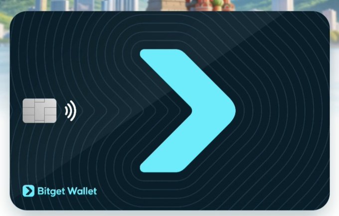 An image of a Bitget Wallet card, featuring a dark background with a turquoise arrow logo and a chip with a contactless payment symbol. It relates to the post by visually representing the "U card" mentioned as the starting point in the recommended money transfer route.