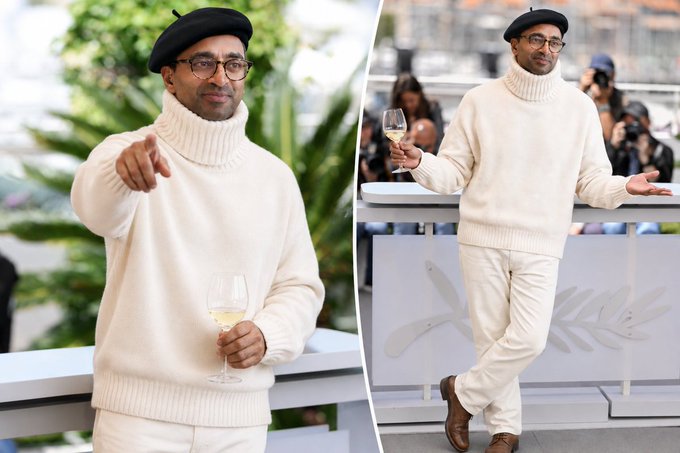 Two photos of a man wearing a black beret, glasses, and a cream-colored turtleneck sweater, holding a glass of white wine at what appears to be the Cannes Film Festival.
