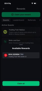 A mobile rewards screen showing active quests including 'Trading Trail: Nebius' for 2500 points, 'Refer and Earn' for 500 points, and available rewards of 604.320804 TRX from a Trading Trail week 2.