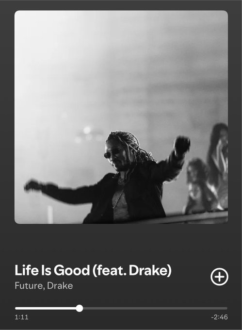 A Spotify music player interface displays the track "Life Is Good (feat. Drake)" by Future and Drake, showing playback at 1:11 of a 2:46 song. The album artwork is a black-and-white photo of a person with long hair and sunglasses performing on stage with outstretched arms.