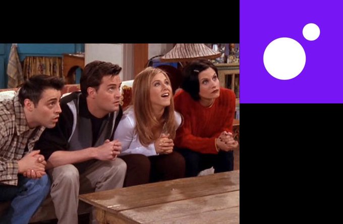 Four characters from the TV show Friends (Joey, Chandler, Rachel, and Monica) lean forward intently while watching television, paired with a purple logo featuring white circles, relating to the post "CT rn" which humorously captures the suspenseful anticipation of watching a scene unfold.