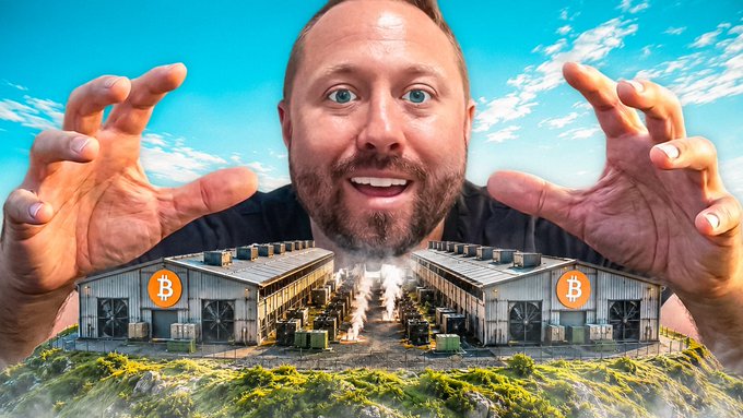 A man with an exaggerated expression holds his hands up over miniature Bitcoin mining warehouses with Bitcoin logos, set against a sky background.