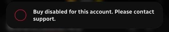 A cropped view of a dark error notification banner displaying the message 'Buy disabled for this account. Please contact support.'
