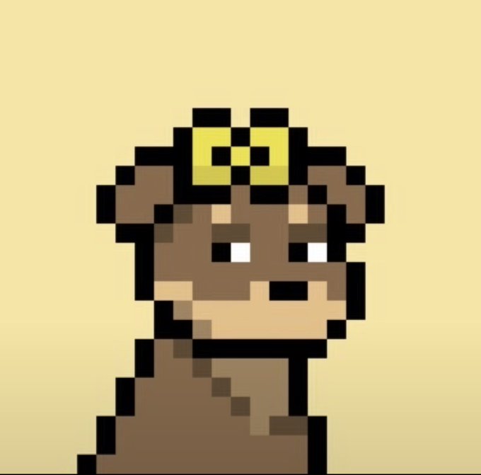 Pixel art style image of a brown bear character wearing a yellow crown on its head, set against a tan background.