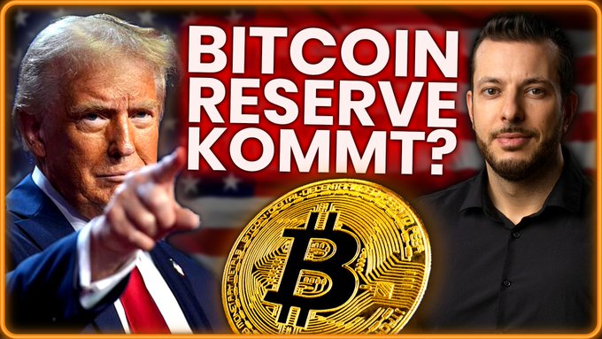 The image features a political cartoon with two men standing next to each other against an American flag backdrop. One man is pointing towards a Bitcoin coin, while the other man has his hand raised in a question or statement about the Bitcoin reserve. The caption of the image reads "BITCOIN RESERVE KOMMT?", which suggests that there might be some confusion or uncertainty regarding the Bitcoin reserve and its implications.
