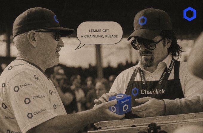 Two men wearing Chainlink-branded caps, shirts, and aprons stand together with one saying in a speech bubble 'LEMME GET A CHAINLINK, PLEASE,' referencing the Chainlink cryptocurrency project.