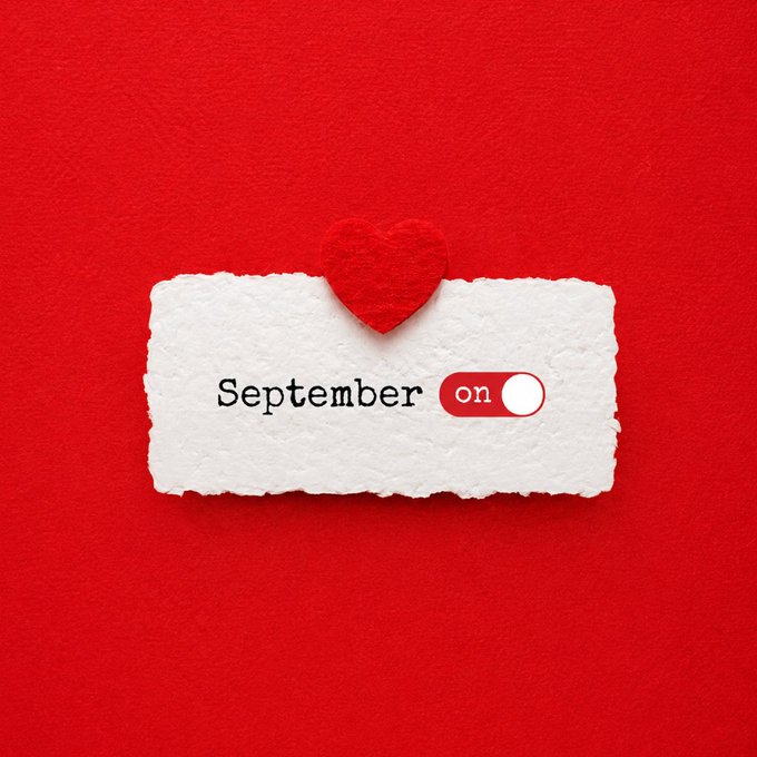 A torn piece of paper on a red background features a small heart and the text 'September' next to a toggle switch set to 'on'.