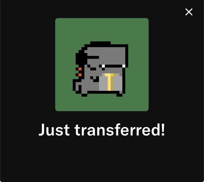 A digital graphic featuring pixel art of a gray, blocky character wearing a hat and a yellow tie, positioned above the bold white text "Just transferred!" on a dark background, with an "x" icon in the top right corner.