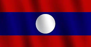 The image displays the national flag of Laos, featuring red and blue horizontal stripes with a white circle in the center. It accompanies a post celebrating the continued expansion of the GCV movement in Laos, specifically highlighting a new verified massage and spa merchant in Vientiane accepting Pi cryptocurrency payments at a rate of 314,159 USD/Pi.