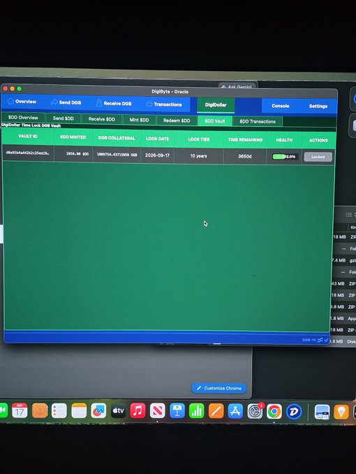 Screenshot of a laptop screen displaying the DigiByte DGD vault interface (DigiByte - Oracle) showing a Send DOD vault overview with a 0.00% health status and 3650 days remaining.