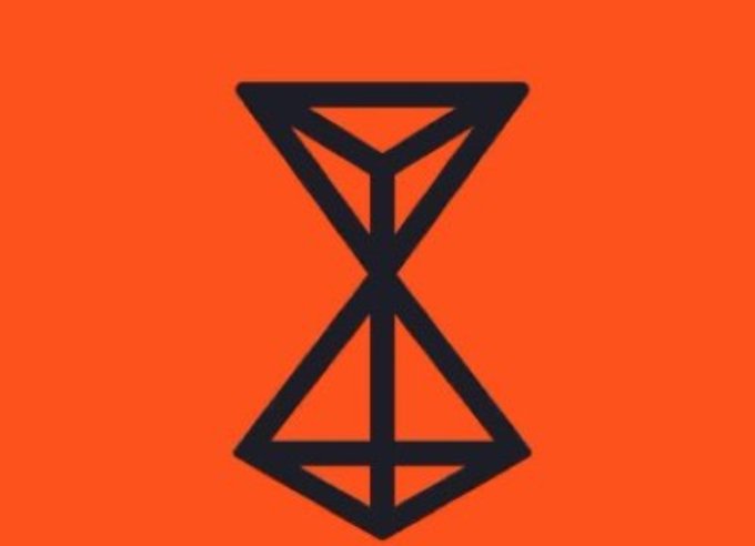 A minimalist graphic featuring a black geometric hourglass-like symbol composed of triangles centered on a solid orange background.