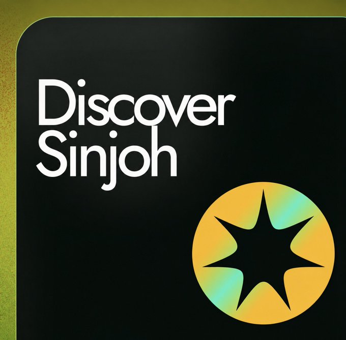 A black card or poster with a gold/yellow border displays 'Discover Sinjoh' in white text alongside a circular logo featuring an eight-pointed star on a yellow-green gradient background.