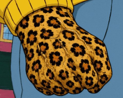 The image features a close-up view of someone's hand, which has an intricate pattern that resembles a leopard print design. The hand appears to have unique tattooed or painted patterns, adding to its distinct appearance. This artwork could possibly be related to the post about diamonds and collecting on the @BoredApeYC site as it is displayed in a close-up image, emphasizing the detailed workmanship involved in creating such an artistic piece.