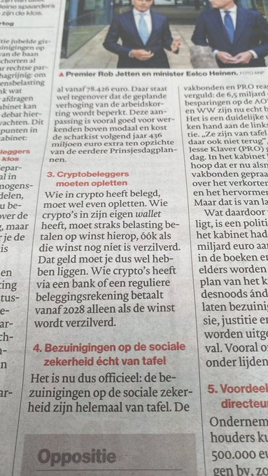 A Dutch newspaper article featuring a photo of Prime Minister Rob Jetten and Minister Eelco Heinen, with visible headlines discussing crypto legislation including "Cryptobeleggers moeten opletten" (Crypto investors must pay attention) and "Bezuinigingen op de sociale zekerheid écht van tafel" (Social security cuts truly off the table). The article directly relates to the post by explaining Section 3 about how crypto self-custody holdings would be taxed annually from 2028 on gains via bank/investment accounts, while self-custodied wallets would only be taxed upon actual profit realization.
