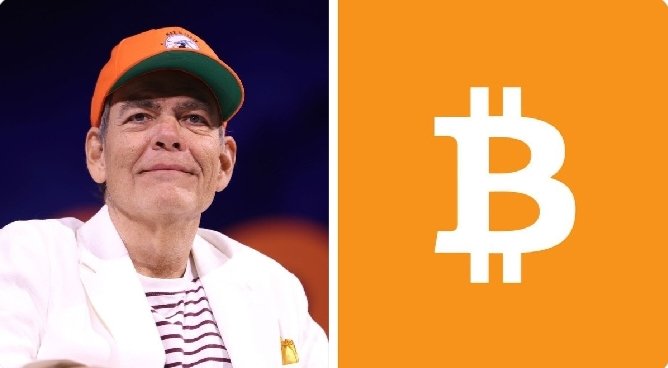 The image shows Max Keiser smiling while wearing an orange cap, alongside the Bitcoin (₿) logo. This pairs with his bold prediction that the U.S. debt crisis could drive Bitcoin above $2,000,000, as he is a well-known Bitcoin advocate often expressing similar views on fiat currency decline.