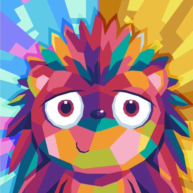 A colorful geometric illustration of a lion's face with bright multicolored features.