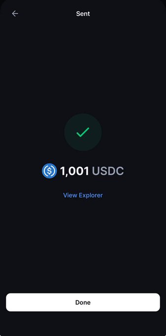 A mobile wallet confirmation screen displays a successful transaction of 1,001 USDC with a green checkmark, "View Explorer" link, and a "Done" button. The screenshot, showing a completed crypto transfer, appears unrelated to the accompanying post about taxation policies and tax analysis protocols.