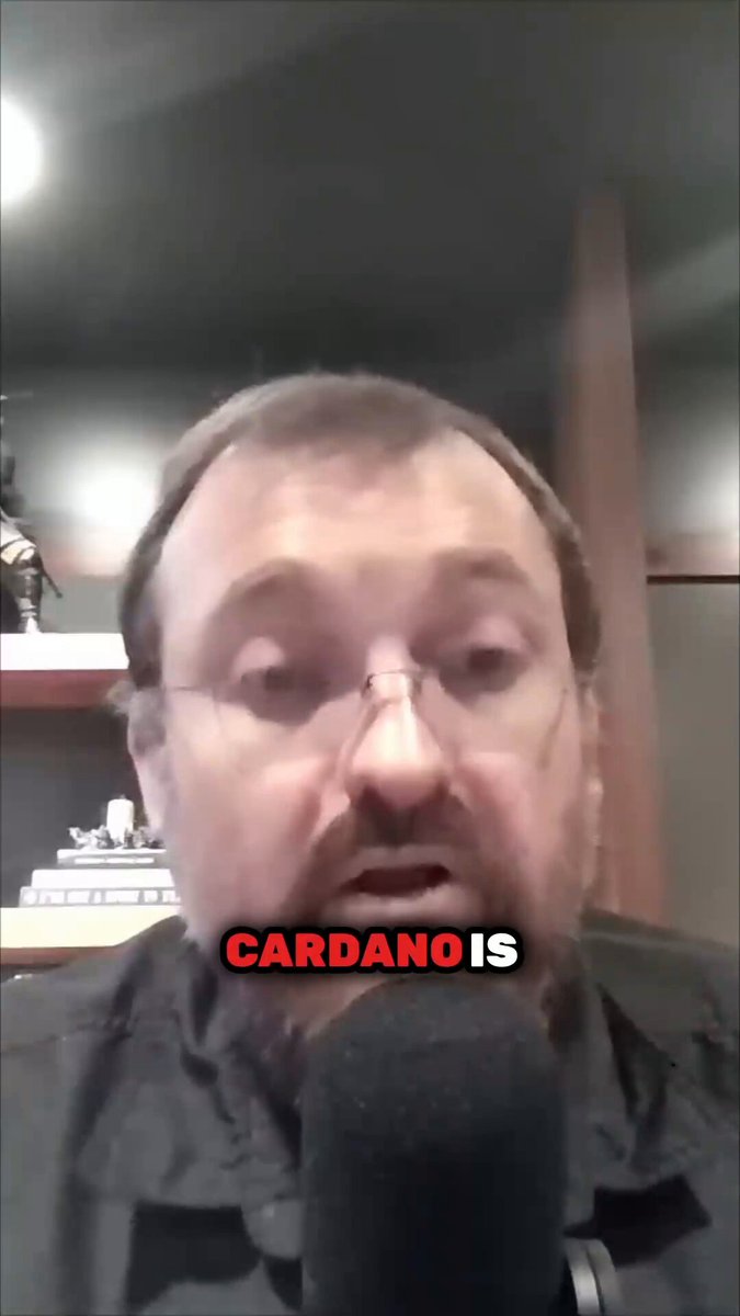The image features a man wearing glasses, with his face partially visible, sitting in front of a microphone. The caption below the photo reads "Cardano Is not a protocol. It'S the people behind the protocol... We can even change the name if we want to. What we can't change is the people behind it." This statement suggests that the man's name might be Cardano, and he could potentially be involved in creating or promoting the protocol.