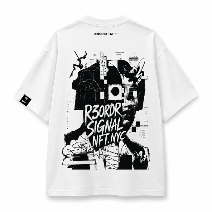 The back of a white oversized t-shirt featuring bold black graphic artwork with the text "R3ORDR | NFT" at the top, "R3ORDR SIGNAL NFT.NYC" prominently across the center, and various chaotic urban/street-art style elements including a skull and abstract markings, aligning with the post's mention of the R3ORDR x NFT.NYC collaboration.