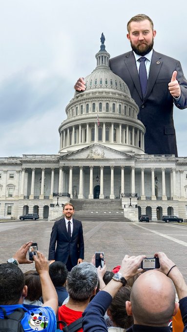 A digitally edited image showing a man in a suit giving a thumbs-up behind the U.S. Capitol dome, with another smaller man standing in the foreground while a crowd takes photos.
