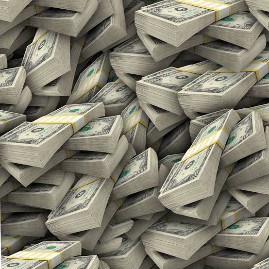A massive pile of bundled $100 bills fills the frame, visually representing unimaginable wealth—fitting for a post joking about $Pi (Pi Network) reaching $314,000, a wildly speculative price target. The image humorously conveys the fantasy of becoming absurdly rich from a Pi coin moonshot.