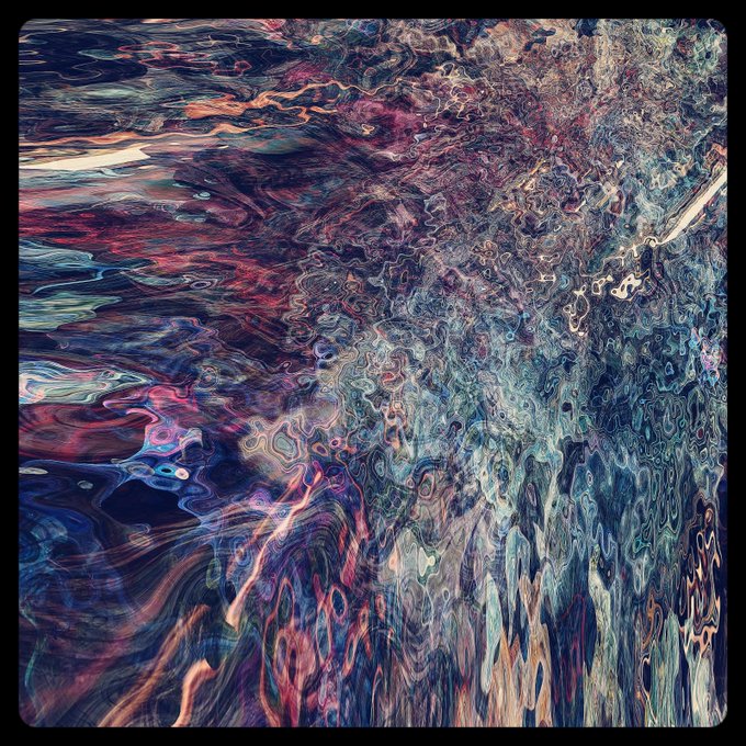 An abstract digital artwork with swirling, distorted patterns in vibrant hues of red, blue, teal, and orange, creating a liquid or marbled visual texture.