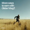 A man sprints through a sunlit golden grass field beneath a clear blue sky, with overlay text reading "More ways to earn with Glider Mag7." The dynamic, forward-moving imagery visually reinforces the post's message about accelerating wealth growth through compounded returns on the Glider Mag7 platform.