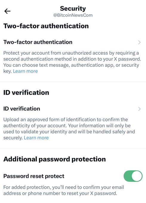 X Security settings showing @BitcoinNewsCom's account with Two-factor authentication, ID verification, and Password reset protect enabled (green toggle on). The screenshot illustrates the recommended security measures mentioned in the post to protect against malicious password reset emails targeting Bitcoin community members.