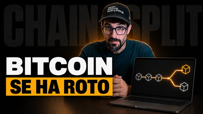 A thumbnail image featuring a bearded man wearing glasses and a black cap with "open source everything" text, sitting in front of a laptop displaying a blockchain fork graphic. Bold text reads "BITCOIN SE HA ROTO" (Bitcoin has broken) with "CHAINSPLIT" faintly in the background, accompanying a YouTube video about Bitcoin's chain split and changes to its Proof of Work algorithm.