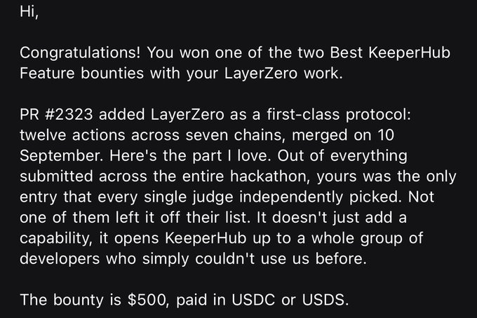 A message announcing the recipient won a Best KeeperHub Feature bounty for their LayerZero work via PR #2323, noting unanimous judge selection and a $500 payout in USDC or USDS.