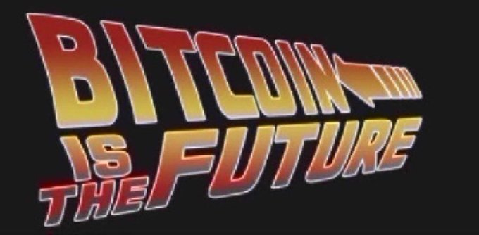A retro-styled graphic with bold text reading 'BITCOIN IS THE FUTURE' in a yellow-to-red gradient against a black background, featuring a stylized rocket design incorporated into the text.